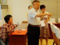 會(huì)場花絮：劉秀晨先生笑談會(huì)場布置(圖)